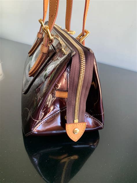 lv vernis shoulder bag repair